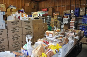 The many food donations recenlty recieved being boxed ready to go.