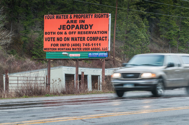 Tony Demin for The New York TimesA billboard at an entrance to the Flathead Reservation in western Montana, where a bitter dispute has divided the residents.