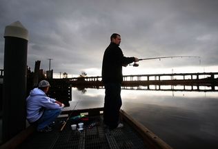 Dan Bates / Herald file photo, 2009Rob Fuller (left) and Andrew Eaton, both of Marysville, cast for sturgeon from the dock at Ebey Waterfront Park in Marysville in October 2009. Marysville has received a federal grant to help fund cleanup near the park.