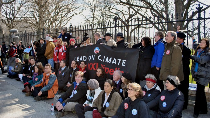 Anti-Keystone XL protesters stage a sit-in in front of the White House in Washington, D.C. on February 13, 2013. Thousands have pledged to engage in civil disobedience along the pipeline’s proposed route. (Photo/chesapeakeclimate via Flickr)