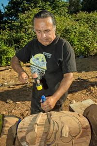 Lummi Master Carver Jewell James at work. Photo: Paul K. Anderson, Chuckanut Conservancy. 