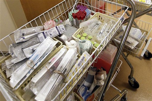 This Oct. 11, 2012 file photo shows a basket of medical supplies await storage in Brookhaven, Miss. The No. 1 question about President Barack Obama’s health care law is whether consumers will be able to afford the coverage. Now the answer is coming in: The biggest study yet of premiums posted publicly by states finds that the sticker price will average about $270 a month if you’re a 21-year-old buying a mid-range policy. That’s before government tax credits that will act like a discount for most people, bringing down the cost based on their income.ROGELIO V. SOLIS, FILE — AP Photo