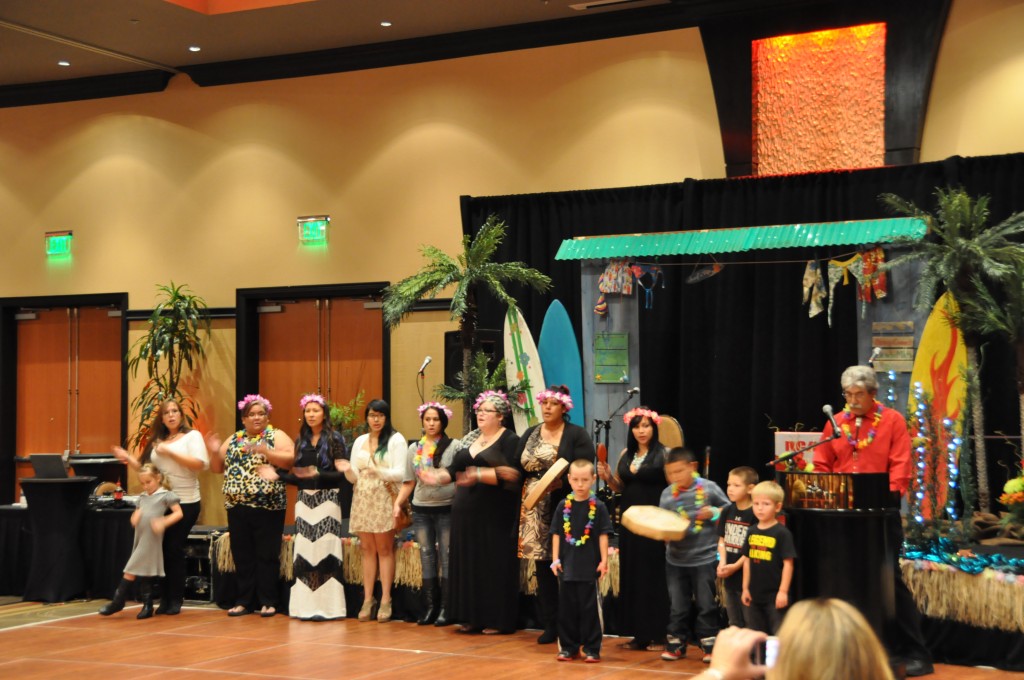 Language department sings welcome song in Lushootseed at the opening of the banquet