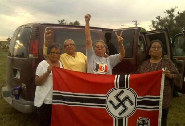 Courtesy Last Real IndiansLakota grandmothers capture Nazi flag in Leith, North Dakota.