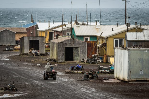  A boy rides a four-wheeler through the rural Alaska community of Savoonga on Saint Lawrence Island in the Bering Sea. Loren Holmes photo 