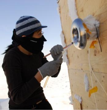 Jin Liao checks the instrumentation in Barrow, Alaska, during a research trip to measure molecular chlorine in the atmosphere. Image-Georgia Tech