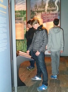 Seattle University Prep students take time to read text about the Treaty of Point Elliot , which established the Tulalip Reservation. Photo/ Brandi N. Montreuil, Tulalip News 