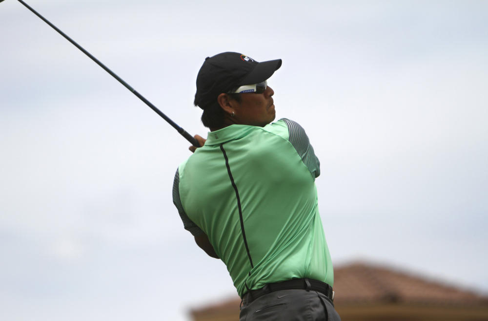 Notah Begay III tees off, Saturday, on the 15th hole during the San Juan Open golf tournament at San Juan Country Club (AP Photo/The Daily Times, Jon Austria)