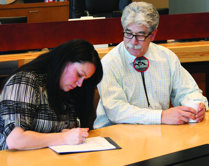 Misty Napeahi, Tulalip Tribes General Manager and Mel Sheldon, Tulalip Tribes Chairman, signing the government-to-government child welfare agreement between the Tulalip Tribes and the State of Washington.Photo/Micheal Rios