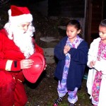 Santa greets children in the Tulalip area. 