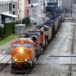 A coal train moves through Seattle en route to Vancouver, B.C. Efforts to bring coal terminals to Washington and Oregon have enlisted some lobbyists and public-relations firms long connected with environmental causes. Photo: Greg Gilbert / The Seattle Times