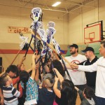 Members of the Washington Stealth lacrosse league introduce the game of lacrosse to members of the Tulalip Boys & Girls Club. 