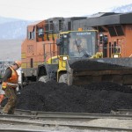 Crews work to clean up spilled coal and repair tracks on Tuesday where three Montana Rail Link rail cars derailed. The derailment near Railroad Street West and Trade Street in Missoula. Photo: Tom Bauer/Missoulian