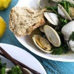 Asian steamed clams with broccoli rabe. Photo: Matthew Mead / Associated Press