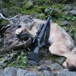 Robert Millage shows his rifle with a wolf he shot Sept. 1, 2009, on the first day of wolf hunting season along the Lochsa River in northern Idaho. Photo: Associated Press