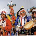 Photos by Robert MastrianniLouis Mofsie, second from right, with dancers from the group Thunderbird American Indian Dancers