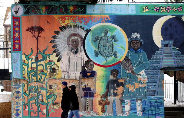 NICOLE BENGIVENO / The New York TimesA mural painted by children at the Little Earth of United Tribes housing complex in Minneapolis. More than 7 in 10 Native Americans now live in metropolitan areas, and many are finding urban life difficult. 