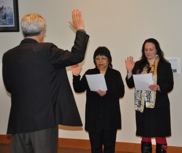 Chairman Mel Sheldon swears in Marie Zackuse and Theresa Sheldon for the Tulalip Board of Directors