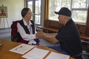 Charlene Nelson, Shoalwater Bay Tribe chair and Guy Miller, Skokomish Tribe chairman, finalize the Skokomish Tribe’s purchase of water quality lab equipment from the Shoalwater Bay Tribe.