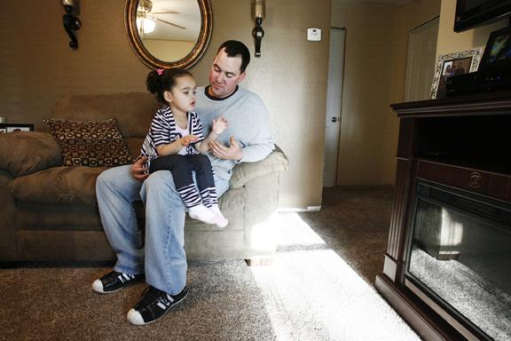  Dusten Brown with daughter Baby Veronica in their Nowata, Oklahoma home (Cherokee Nation)