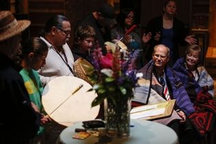 Nick Adams/ The HeraldMarysville School District Superintendent Dr. Larry Nyland and Assistant Superintendent Gail Miller listen to songs by the Tulalip Tribes during a retirement party at the Hibulb Cultural Center on May 30. Both school officials are retiring.