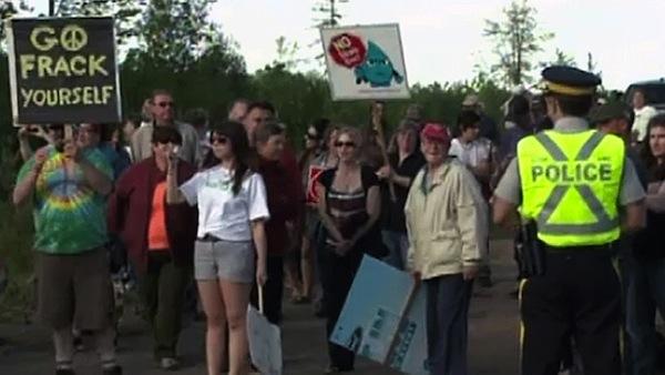 Via APTN NewsAnti-fracking protesters in New Brunswick in early June.