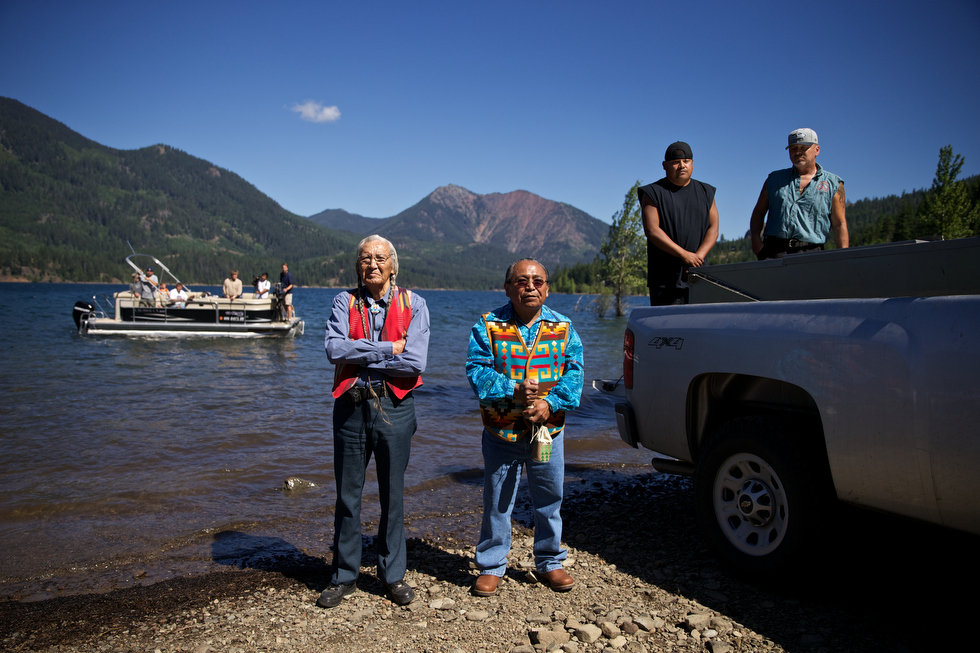 LAKE CLE ELUM, WASHINGTON - Jun. 13, 2013 - Tribal elder Russell Jim, left, and Tribal Council Member Gerald Lewis conduct a blessing ceremony before releasing sockeye salmon into the lake, Wednesday, July 10, 2013, to mark the first return of sockeye salmon to Lake Cle Elum in 100 years. Sockeye salmon were reintroduced to the lake in 2009 by the Yakama Nation and the fish released today are the first of those salmon to return to the lake. Thomas Boyd/The Oregonian 