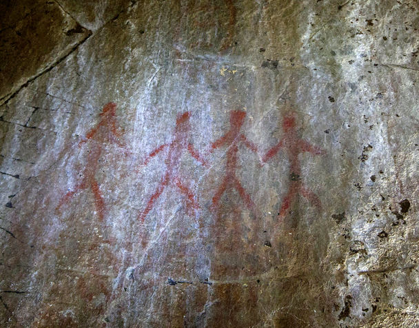 STEVE RINGMAN / THE SEATTLE TIMESPrehistoric Indian art on a cave on Robert Zornes’ property.
