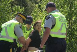 A photo taken by Miles Howe on June 21st, when 12 arrests were made near the sacred fire encampment in Elsipogtog.