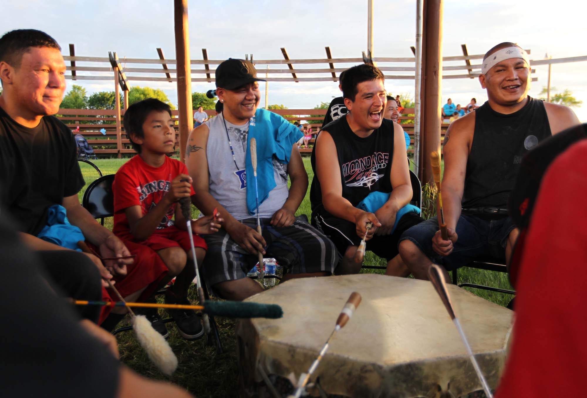 Drummers shared a laugh during a celebration for Ojibwe language revitalization at the Red Lake Indian Reservation last week. The tribe is exploring rewriting its constitution, to better reflect both its cultural values and modern government.Photo by ANNA REED