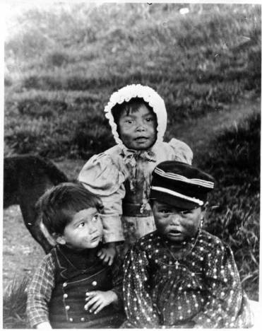 Three young Tlingit children. Photo from Vincent Soboleff Photograph Collection, ca. 1896-1920. Alaska State Library - Historical Collections.