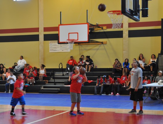 Kids were given tips from Shoni about how to improve their form as they practiced making baskets.