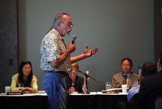 Dan Bates / The Herald At the Comcast Arena Conference Center on Tuesday, Jim Andersen, of Lynnwood, addresses concerns and asks questions regarding rules about Initiative 502. It was one in a series of public hearings by the Washington State Liquor Control Board .