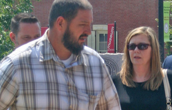 Matt and Melanie Copabianco (back left and right) arrive at Cherokee Nation Courthouse on Aug. 16 for a custody hearing involving a 3-year-old Cherokee girl they are trying to adopt.LISA SNELL | NATIVE TIMES PHOTO