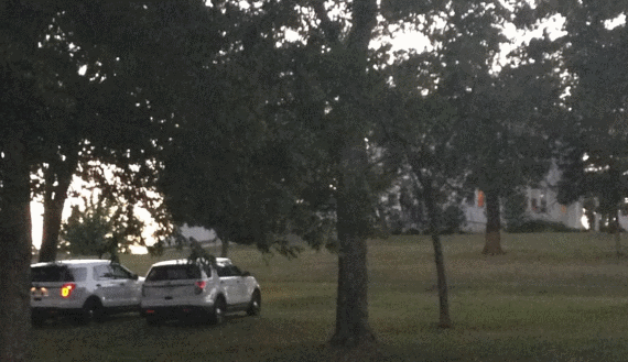US Marshal vehicles out in front of the Jack Brown House on Monday evening.