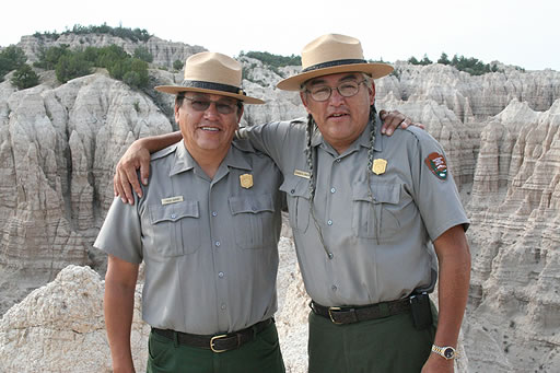 Gerard Baker (right) with a fellow park ranger during his time as superintendent at Mount Rushmore. (PBS) 