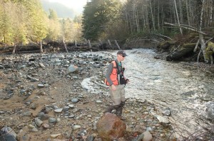 Eric Marks, salmon biologist for the Puyallup Tribe of Indians, conducts a spawning survey downstream from a new logjam.