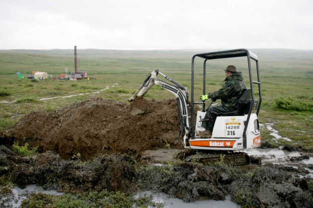 FILE- In this July 13, 2007 file photo, a worker with the Pebble Mine project test drills in the Bristol Bay region of Alaska near the village of Iliamma, Alaska. An EPA report indicates a large-scale copper and gold mine in Alaska's Bristol Bay region could have devastating effects on the world's largest sockeye salmon fishery and adversely affect Alaska Natives, whose culture is built around salmon. Photo: AL Grillo, AP