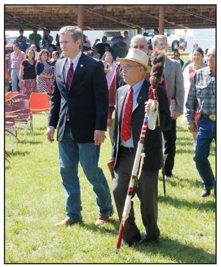 Thomas Shortbull (right), president of Oglala Lakota College, and Brendan V. Johnson, United States Attorney for the District of South Dakota, lead the procession during OLC’s 2013 commencement.