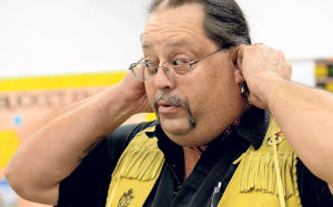 Lee Luther JrFormer Monacan tribal council member Joseph Twohawks, shown here interacting with students at Rockfish River Elementary School in Nelson County, said gaining federal recognition can be a matter of pride. “For most people, you’ve called yourself something for all these many years, and now somebody with the powers that be agrees with it,” he said.