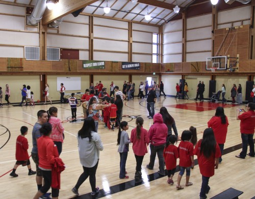 The new Don Hatch Youth Center's gym still displays on the walls cutouts of the former basketball court flooring that new center's basketball court replaced. Photo/ Brandi N. Montreuil, Tulalip News
