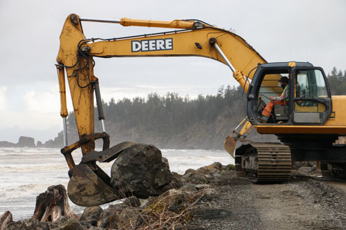 Placement of armor rock was conducted on Saturday, March 29, which will help decrease the vulnerability to wave action to the slope.Photo/ Brandi N. Montreuil, Tulalip News