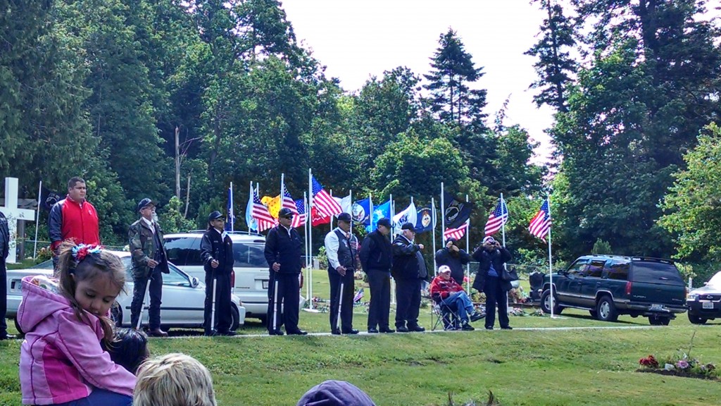Tulalip Honor guard.Seated at the end of the line is World War II veteran Charlie "Red" Sheldon. Photo: Andrew Gobin/Tulalip News