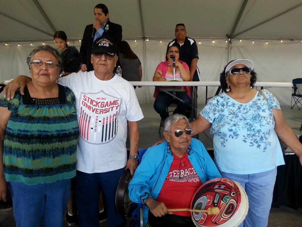 1.The Tom family sings an honor song for past stick game players. Loretta Tom, Isadore “Dobie” Tom, Al Tom, and Vivian GeorgePhoto: Nessie Hatch-Anderson