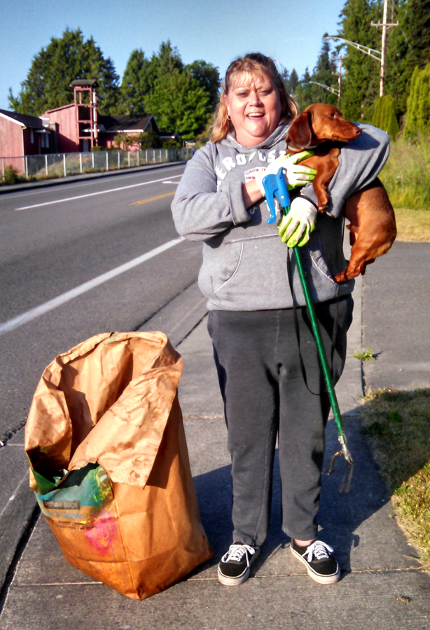 Jennifer Green and sidekick Jasper are helping to keep the Tulalip community clean.