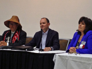 NCAI President Brian Cladoosby, middle, BIA undersecretary for Indian Affairs Kevin Washburn, middle, and NCAI executive director Jacqueline Pata, left. (Photo by Lori Townsend, APRN – Anchorage)