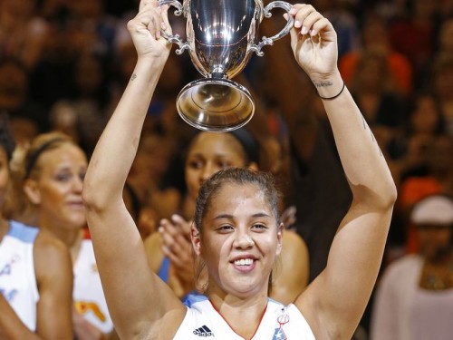 The East's Shoni Schimmel celebrates with her MVP following their 125-124 win over the West in the WNBA All-Star Game Saturday, July 19, 2014 in Phoenix, Ariz. (Photo: David KadlubowskI/azcentral sports)