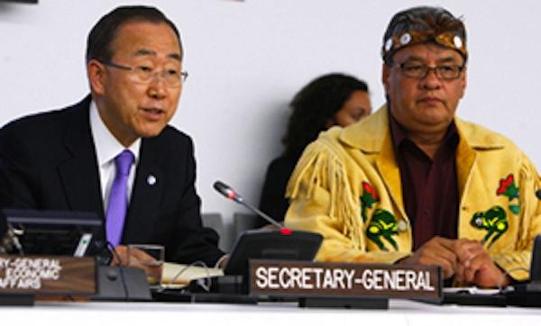 UN Photo/Devra BerkowitzLeft, UN Secretary-General Ban Ki-moon, and right, Grand Chief Edward John, Hereditary Chief of Tl'azt'en Nation and head of the First Nations Summit, as well as Vice Chairperson of the UN Permanent Forum on Indigenous Issues, in 2012.