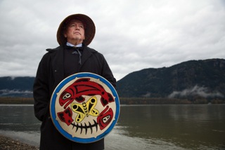 Glen Gobin, Tulalip Tribal Member and Tulalip Tribe Board of Directors Treasurer along the shores of the Fraser River after the ceremony.
