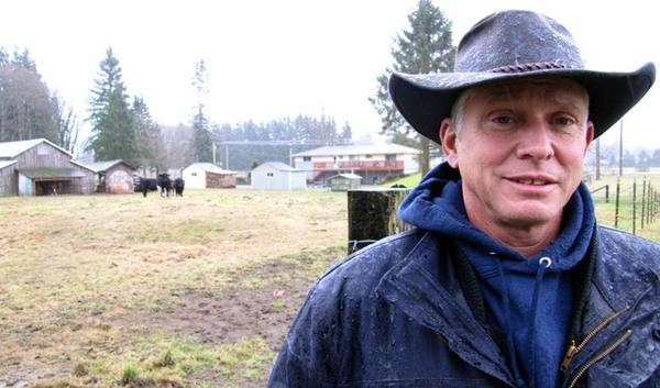 Richard Fox and his wife, Marnie, want to build a house and garage on their property near the Skagit River. The state says they can't have access to the water necessary to approve their building permit.ASHLEY AHEARN